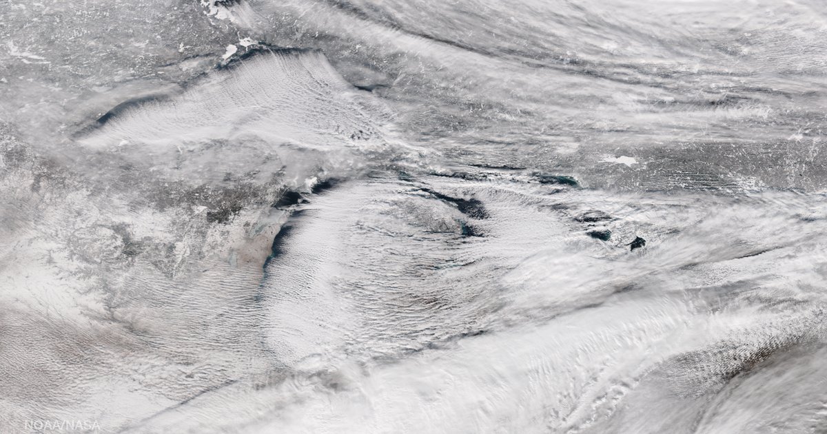 NASA satellite image of lake-effect snow streaming off the Great Lakes — the kind of early-season cold that reaches the northern US by Halloween