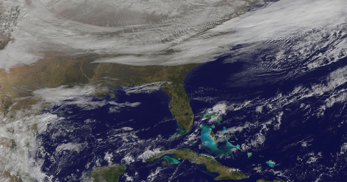 An Arctic cold front sweeping across the eastern United States in a GOES-East satellite image, illustrating the kind of cool-air outbreak that drove late-July 2026 record-low temperatures